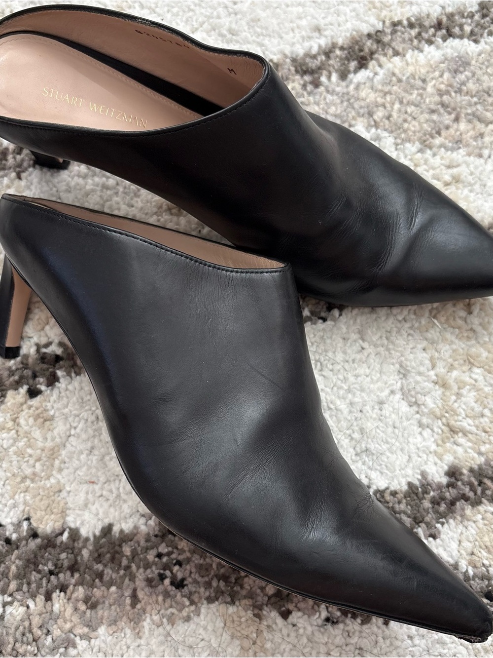 Stuart Weitzman
Leather Mules - black